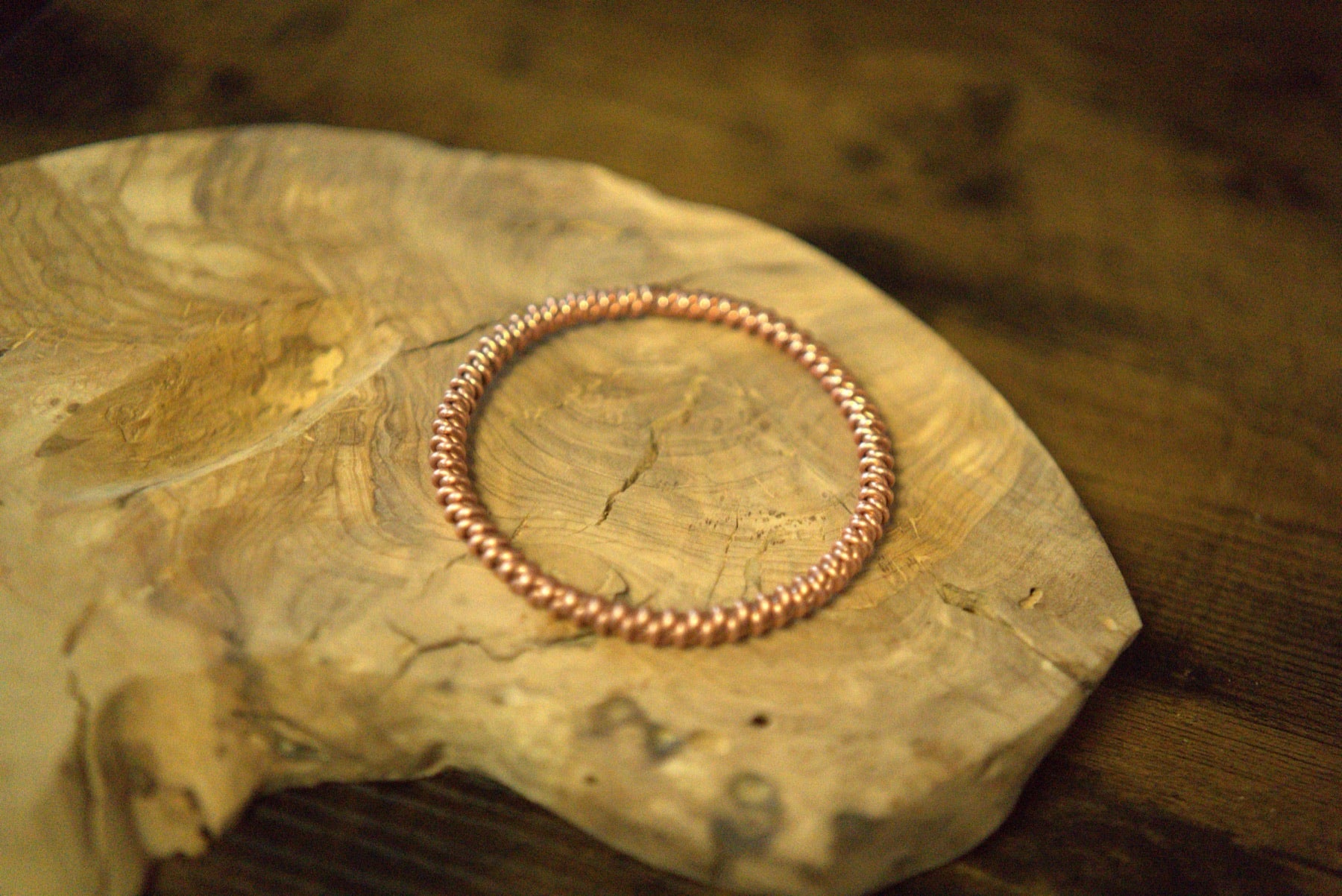 Double-twist copper ring