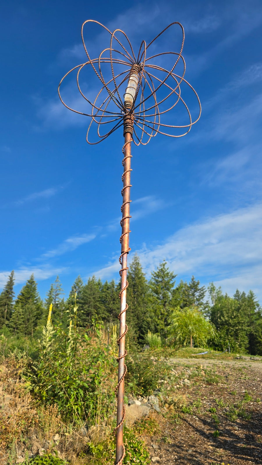 The Electroculture Harmonizer Antenna standing in a living garden